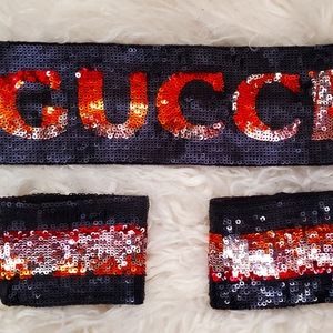 Gucci sequin headband and cuffs.